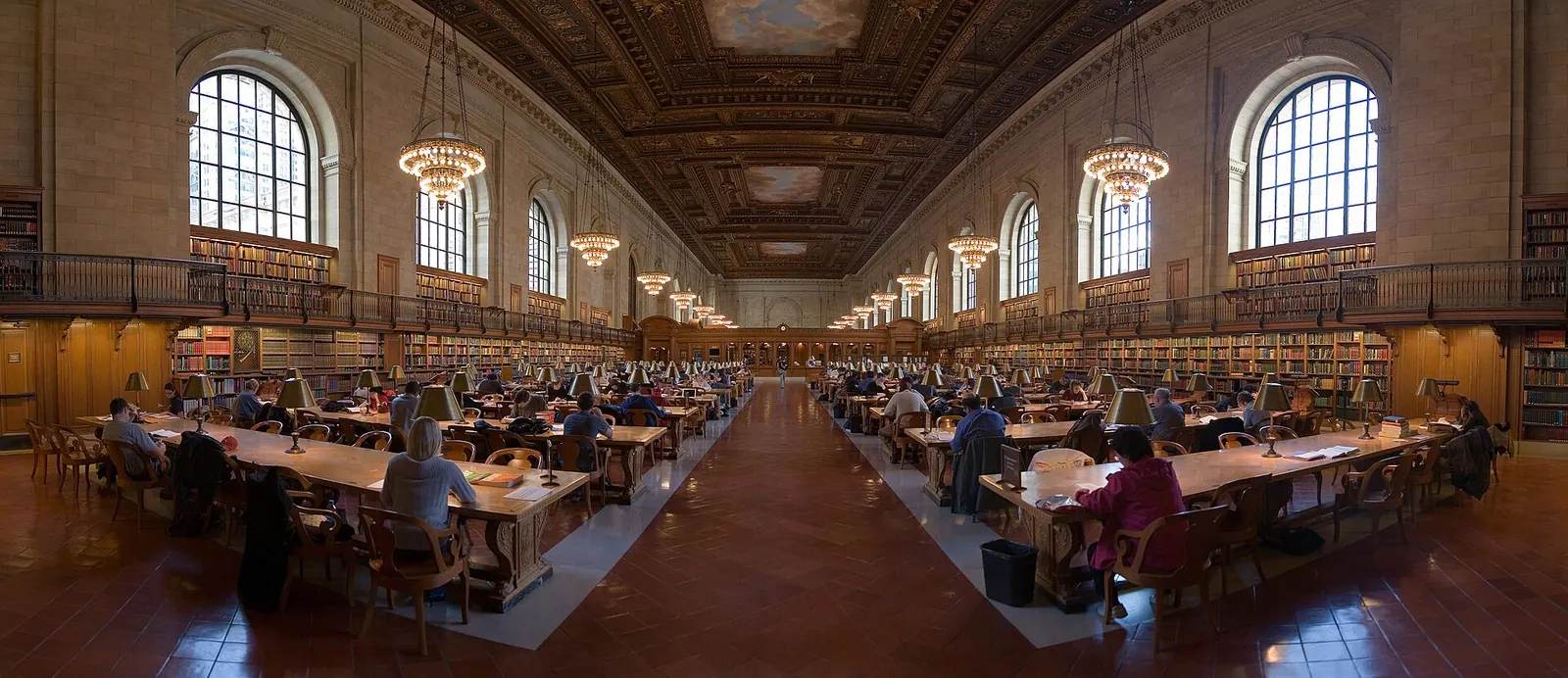 Rows of leather-bound law books in a long reading room